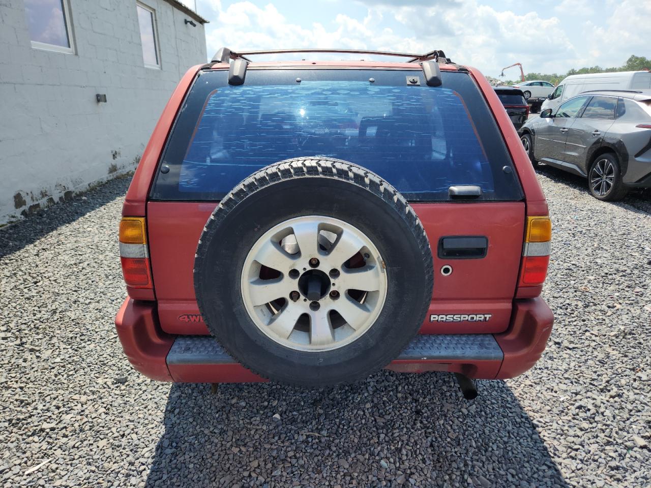 1999 Honda Passport Ex VIN: 4S6CM58W1X4403546 Lot: 63755885