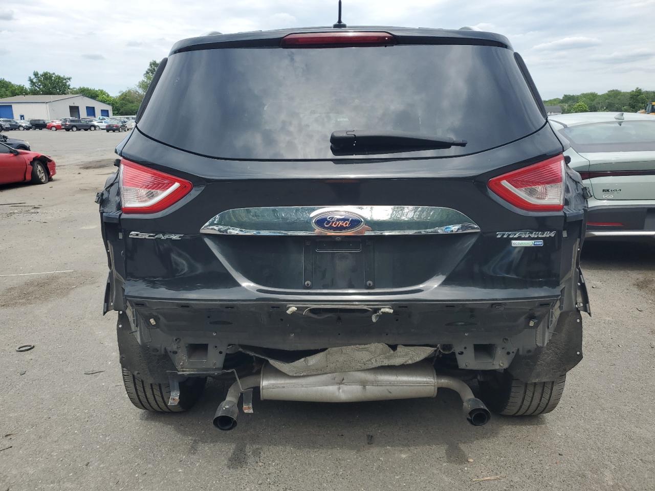 2015 Ford Escape Titanium VIN: 1FMCU9J91FUB67788 Lot: 65221475
