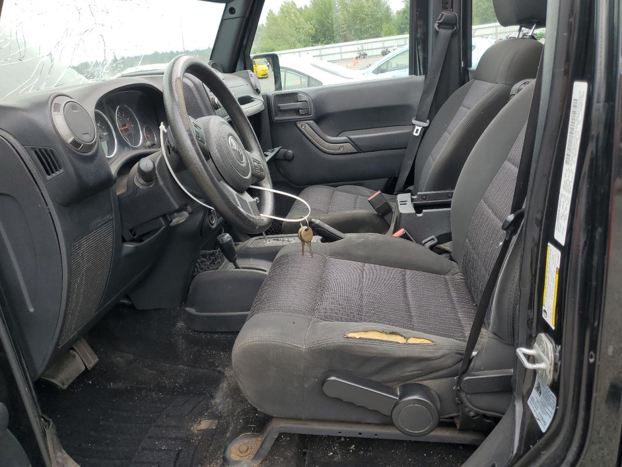 2012 Jeep Wrangler Unlimited Sport VIN: 1C4BJWDG5CL120301 Lot: 65282375