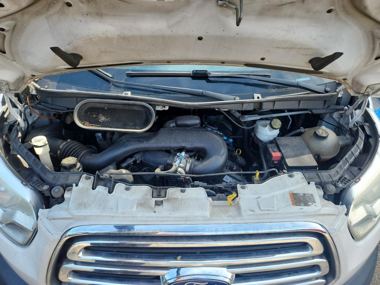 2016 Ford Transit T-150 VIN: 1FTYE1ZMXGKA33683 Lot: 63205115