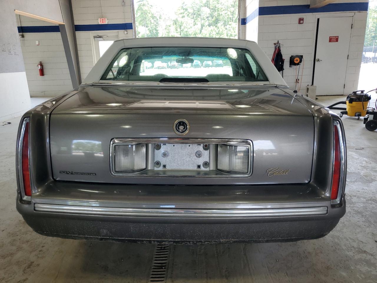 1998 Cadillac Deville VIN: 1G6KD54Y1WU788981 Lot: 64370095