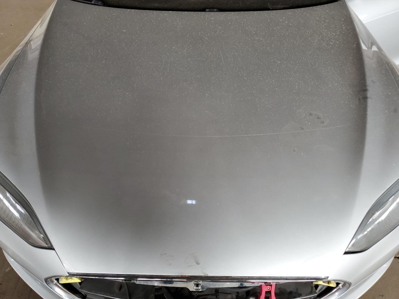 2014 Tesla Model S VIN: 5YJSA1H19EFP61319 Lot: 64798375