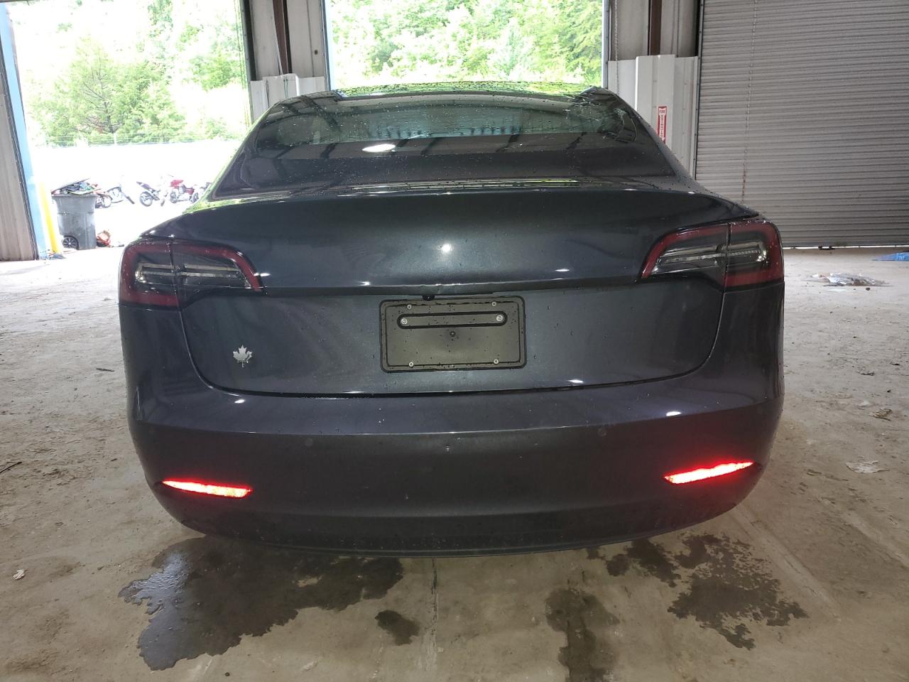 2021 Tesla Model 3 VIN: 5YJ3E1EB2MF974231 Lot: 65343005