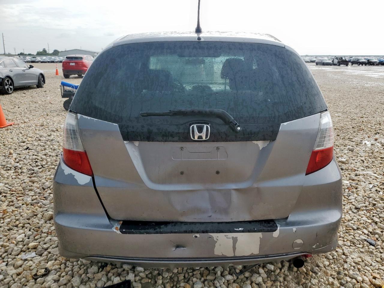 2009 Honda Fit Lx VIN: JHMGE88509S811893 Lot: 63113515