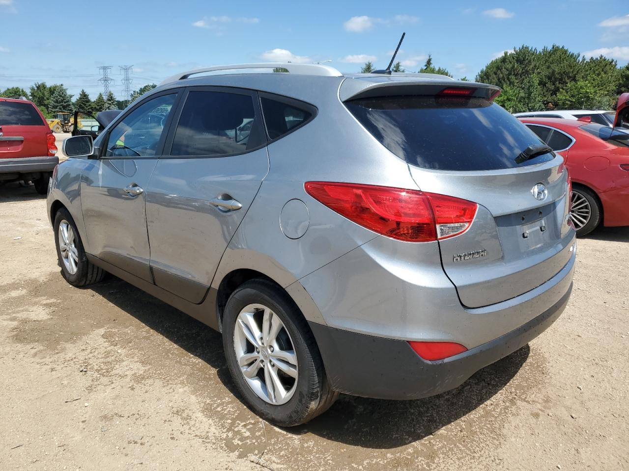 2010 Hyundai Tucson Gls VIN: KM8JUCAC9AU033720 Lot: 65290215