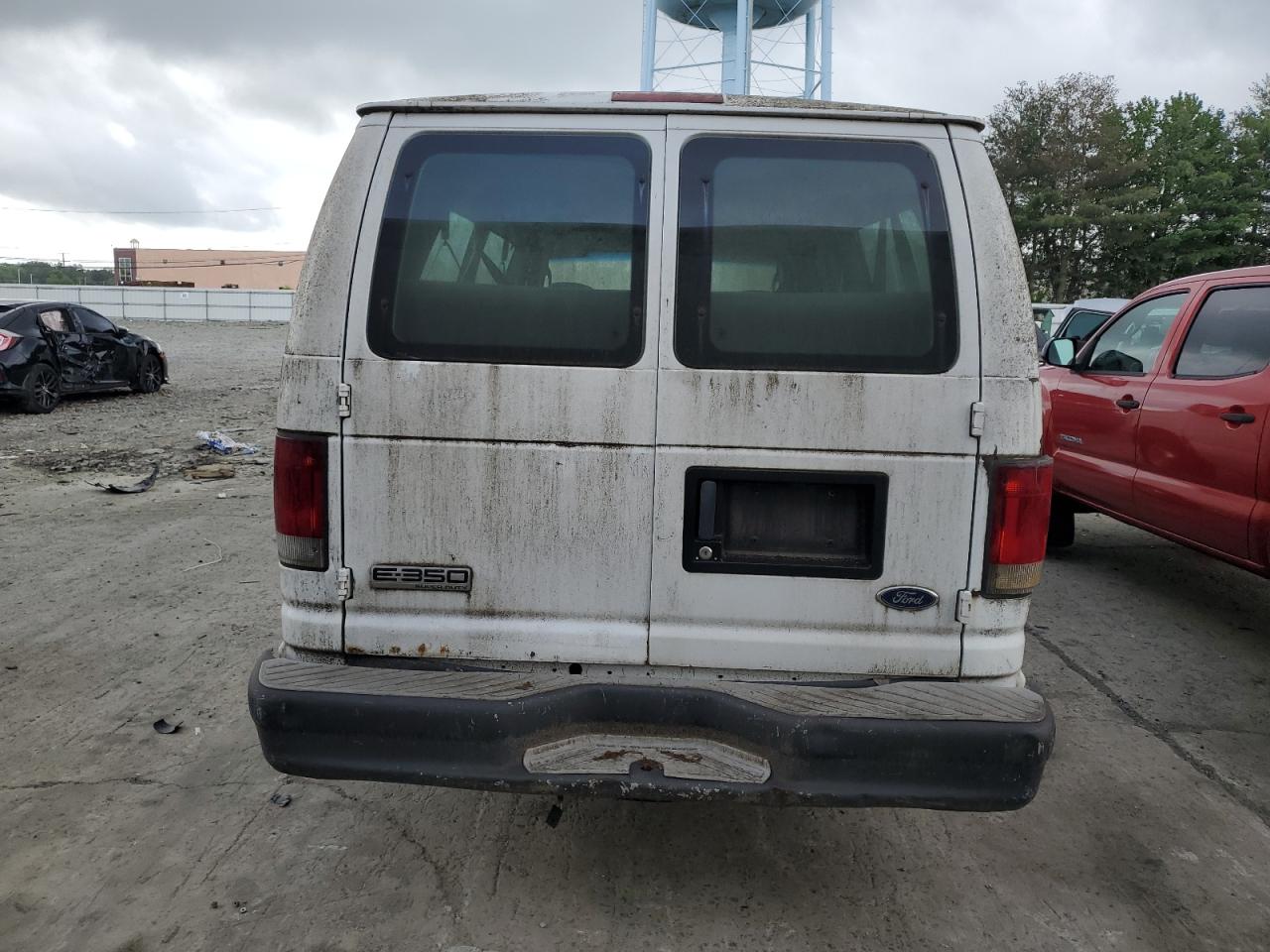2003 Ford Econoline E350 Super Duty Wagon VIN: 1FBSS31L83HB63003 Lot: 63687075