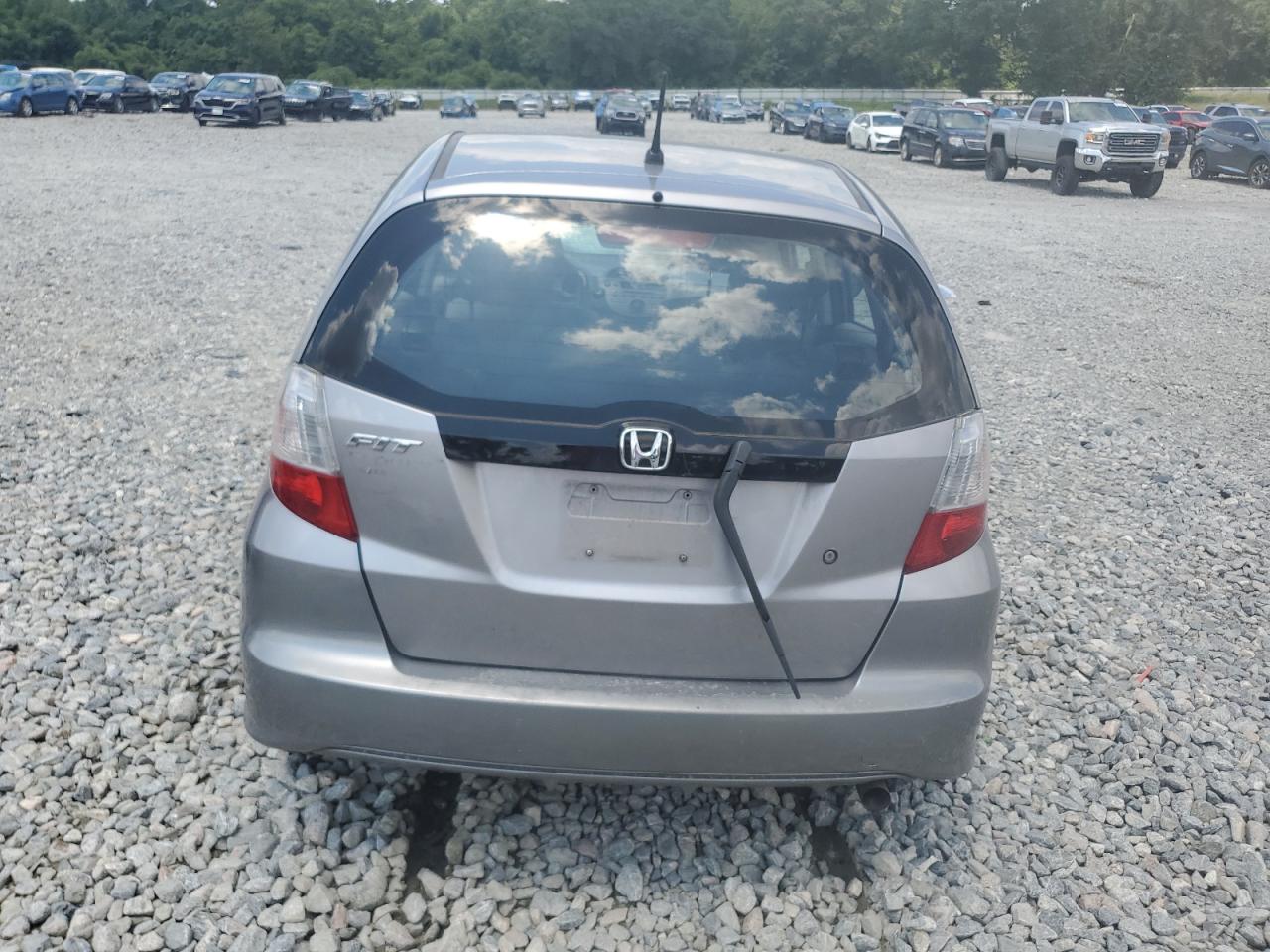 2009 Honda Fit VIN: JHMGE88209S052944 Lot: 65504835