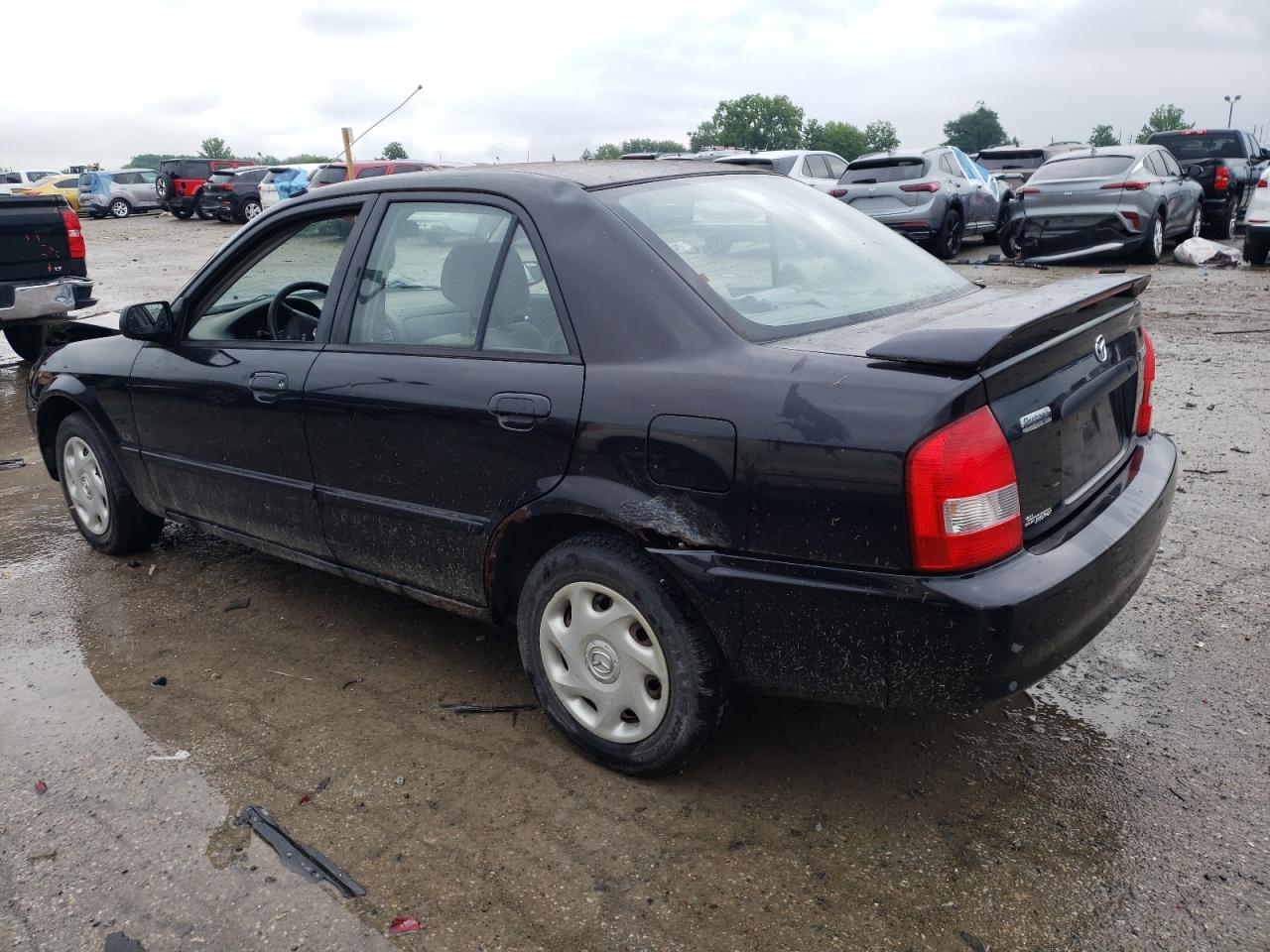2001 Mazda Protege Dx VIN: JM1BJ222010414736 Lot: 65020415