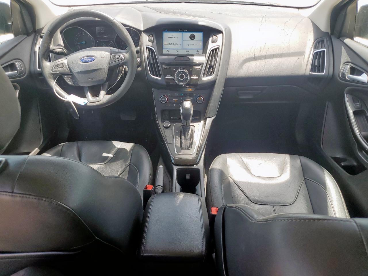 2017 Ford Focus Titanium VIN: 1FADP3J20HL253446 Lot: 64196895