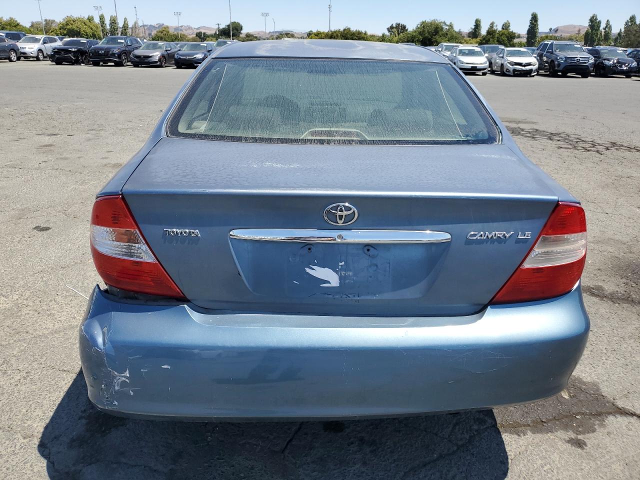 2003 Toyota Camry Le VIN: JTDBE32K930175703 Lot: 64996775