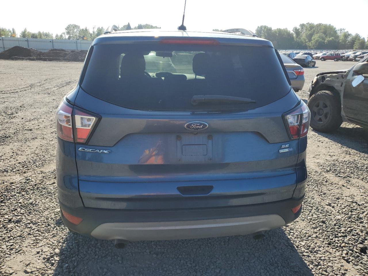 2018 Ford Escape Se VIN: 1FMCU9GD2JUA86612 Lot: 65202755