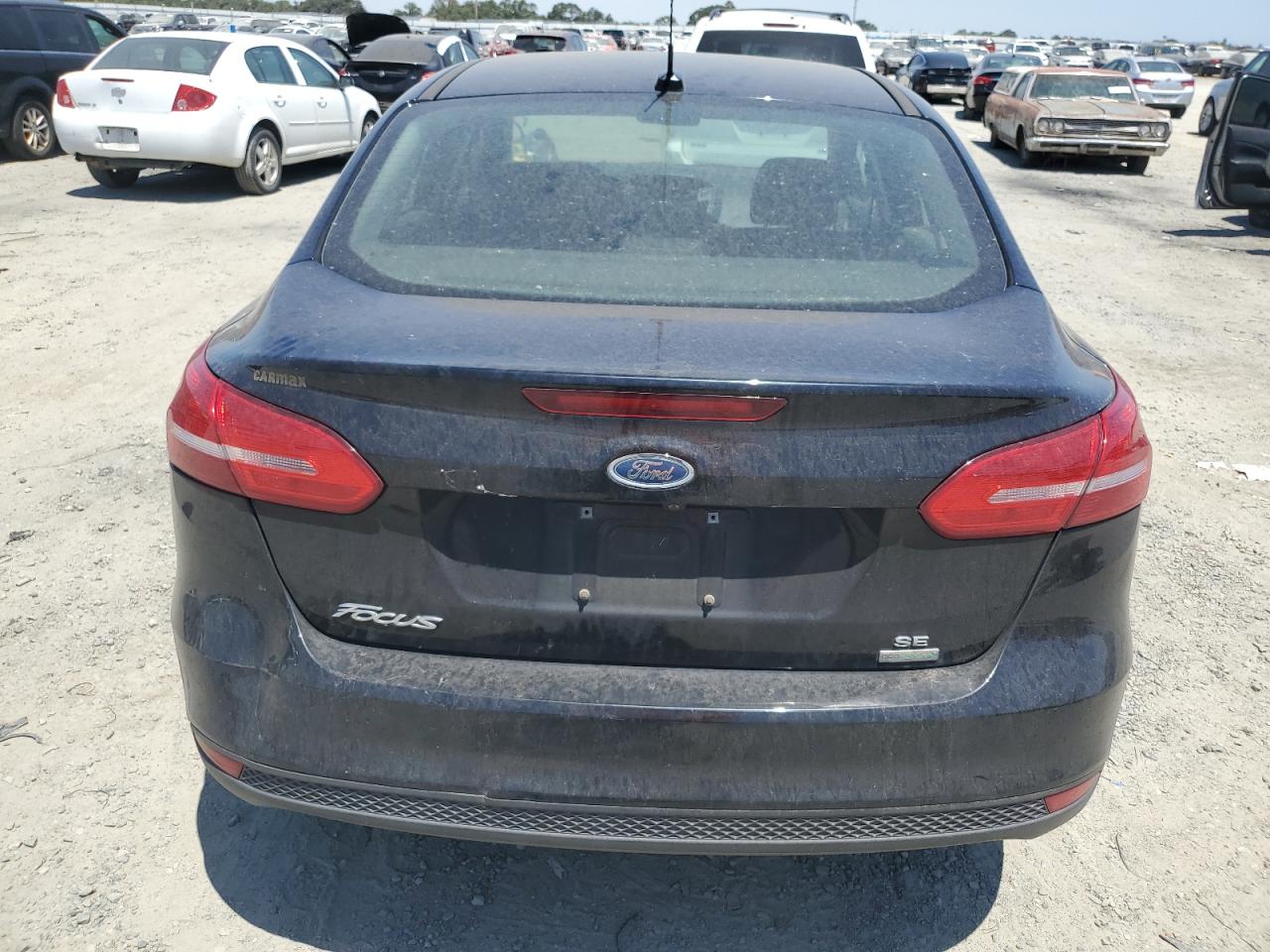 2018 Ford Focus Se VIN: 1FADP3FE8JL205699 Lot: 63300795