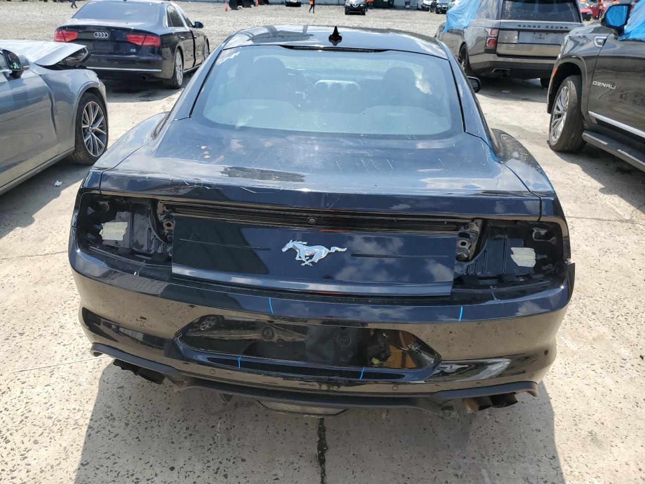 2021 Ford Mustang VIN: 1FA6P8THXM5109912 Lot: 63009095
