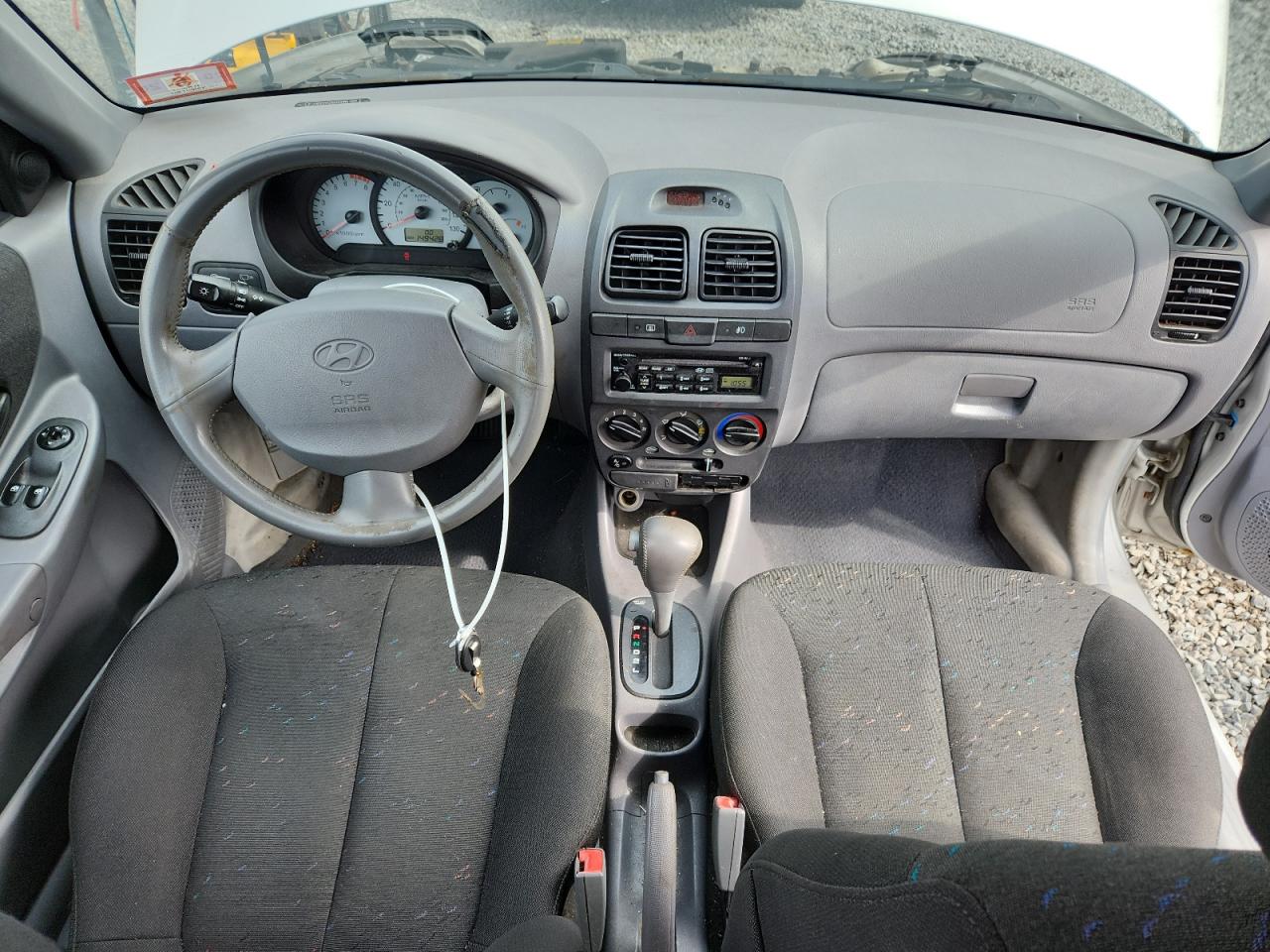 2004 Hyundai Accent Gl VIN: KMHCG35CX4U306713 Lot: 64479445