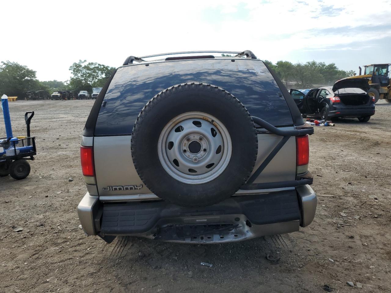 2001 GMC Jimmy VIN: 1GKCT18W71K102005 Lot: 63126475