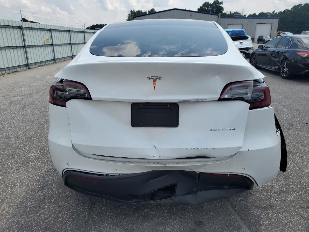 2021 Tesla Model Y VIN: 5YJYGDEEXMF299157 Lot: 63299075