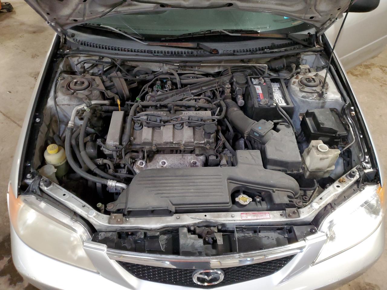 2002 Mazda Protege Dx VIN: JM1BJ225X20513110 Lot: 64604065
