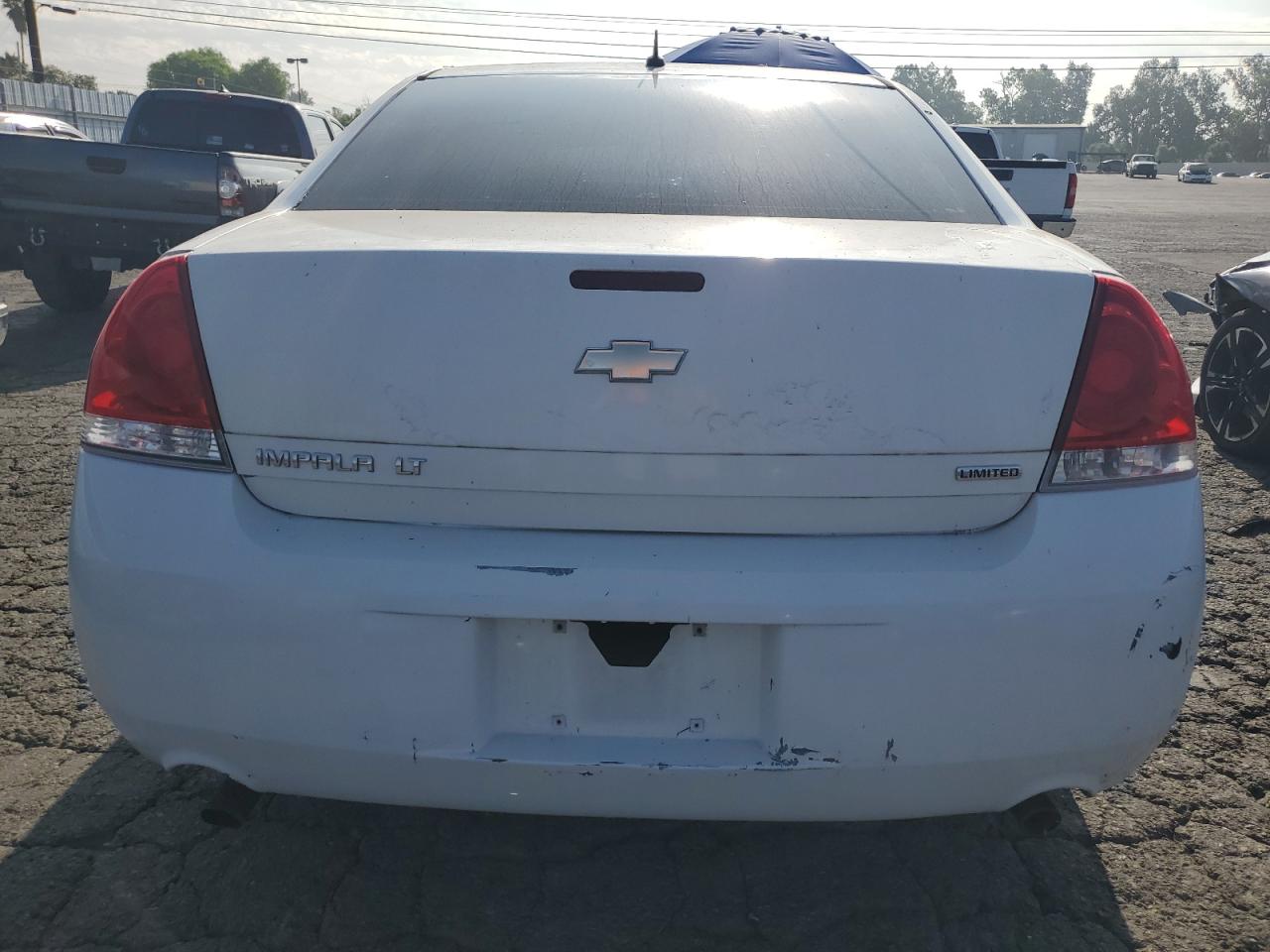 2014 Chevrolet Impala Limited Lt VIN: 2G1WB5E3XE1128402 Lot: 63413525