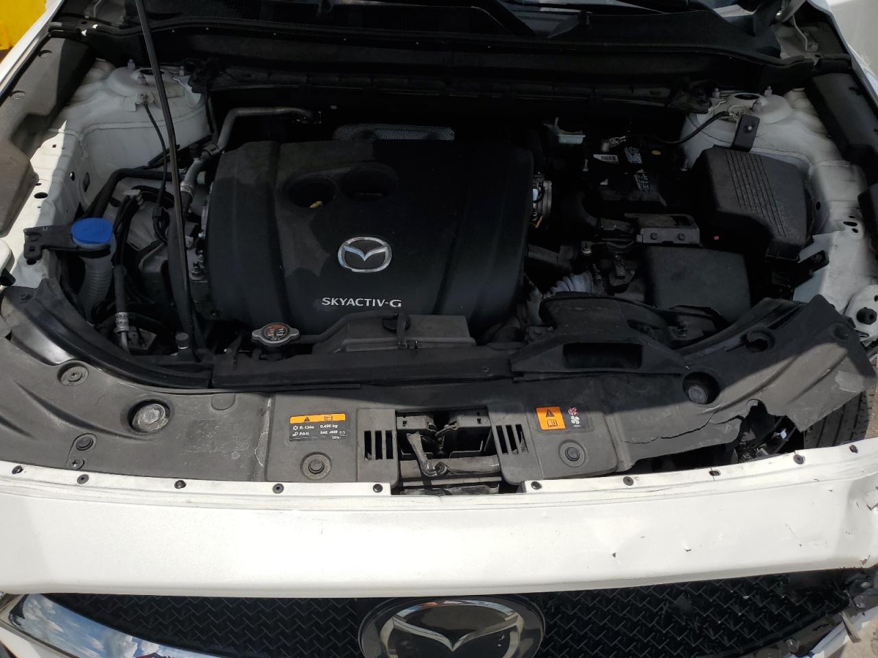 2021 Mazda Cx-5 Touring VIN: JM3KFACM3M0393677 Lot: 64406325