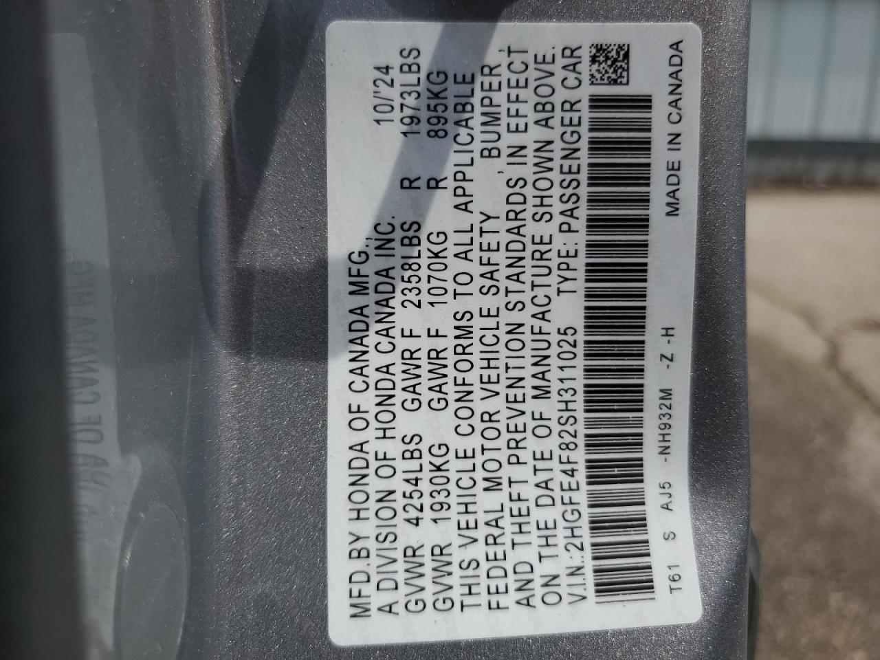 2025 Honda Civic Sport VIN: 2HGFE4F82SH311025 Lot: 65310925
