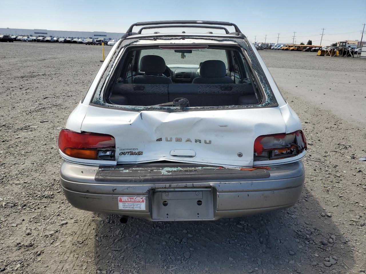 1998 Subaru Impreza Outback VIN: JF1GF4852WG804083 Lot: 64622195