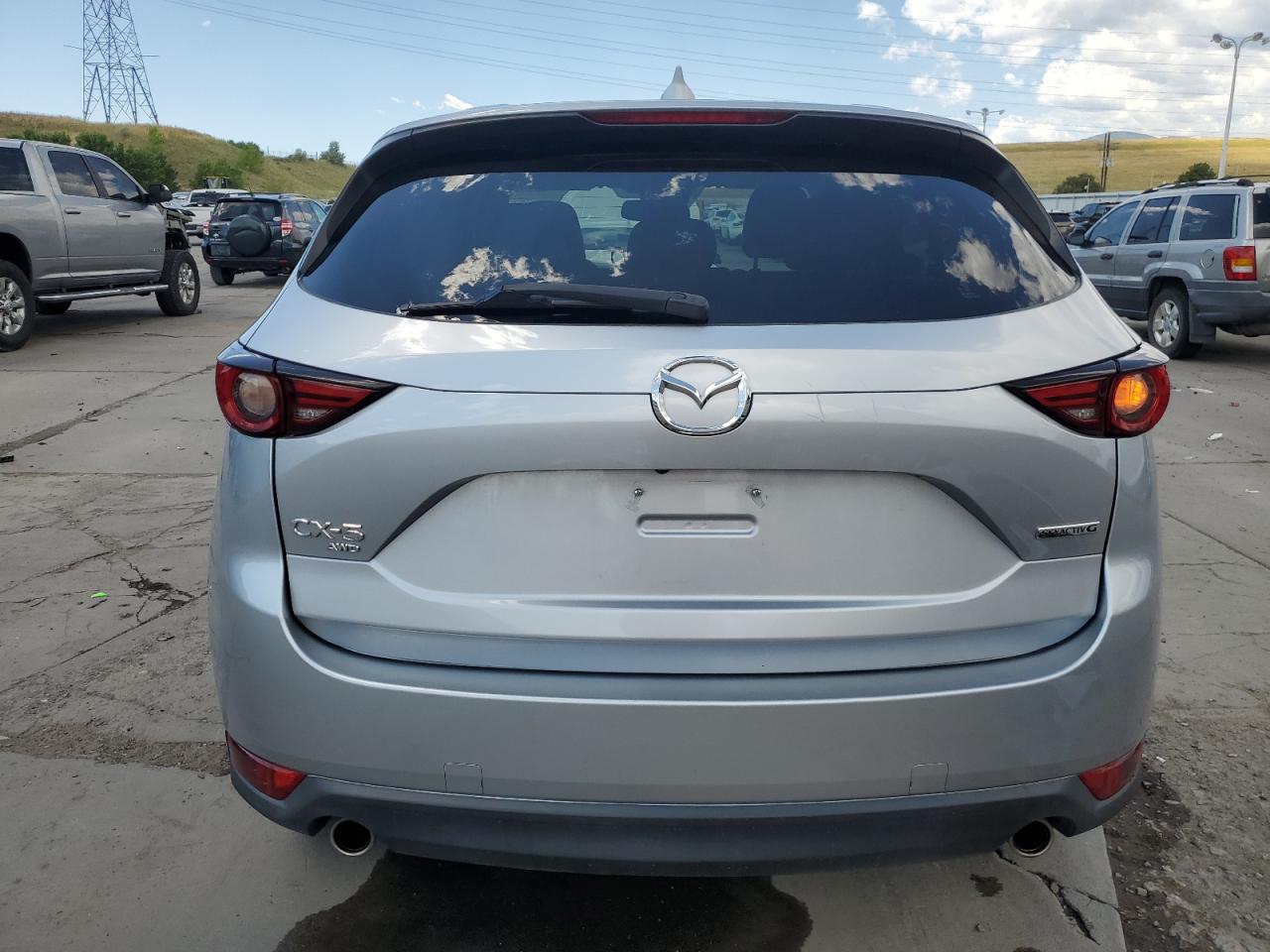 2021 Mazda Cx-5 Grand Touring VIN: JM3KFBDM9M1389986 Lot: 64254865