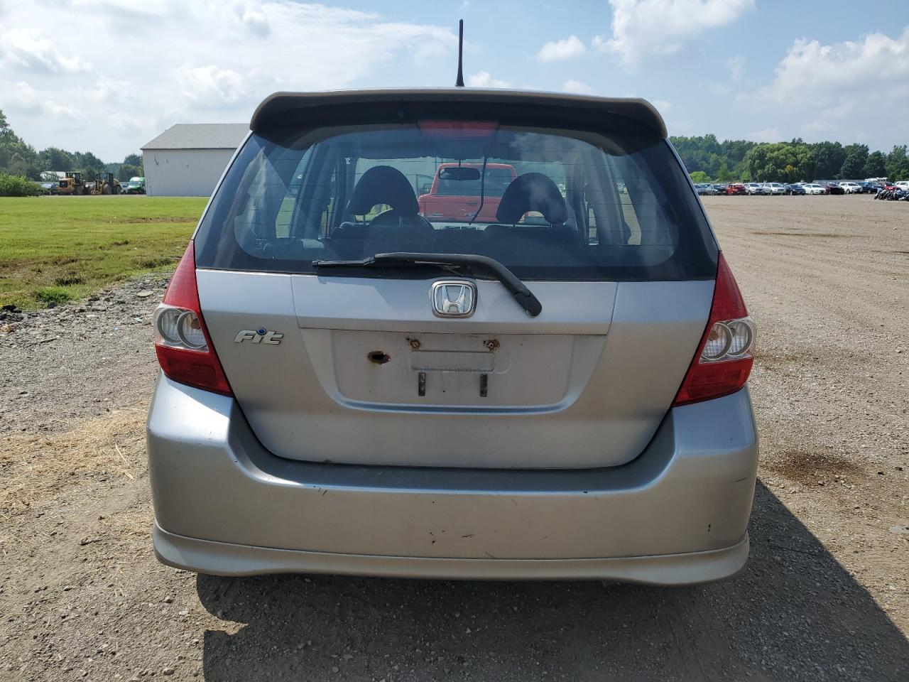 2007 Honda Fit S VIN: JHMGD38687S067648 Lot: 64657345