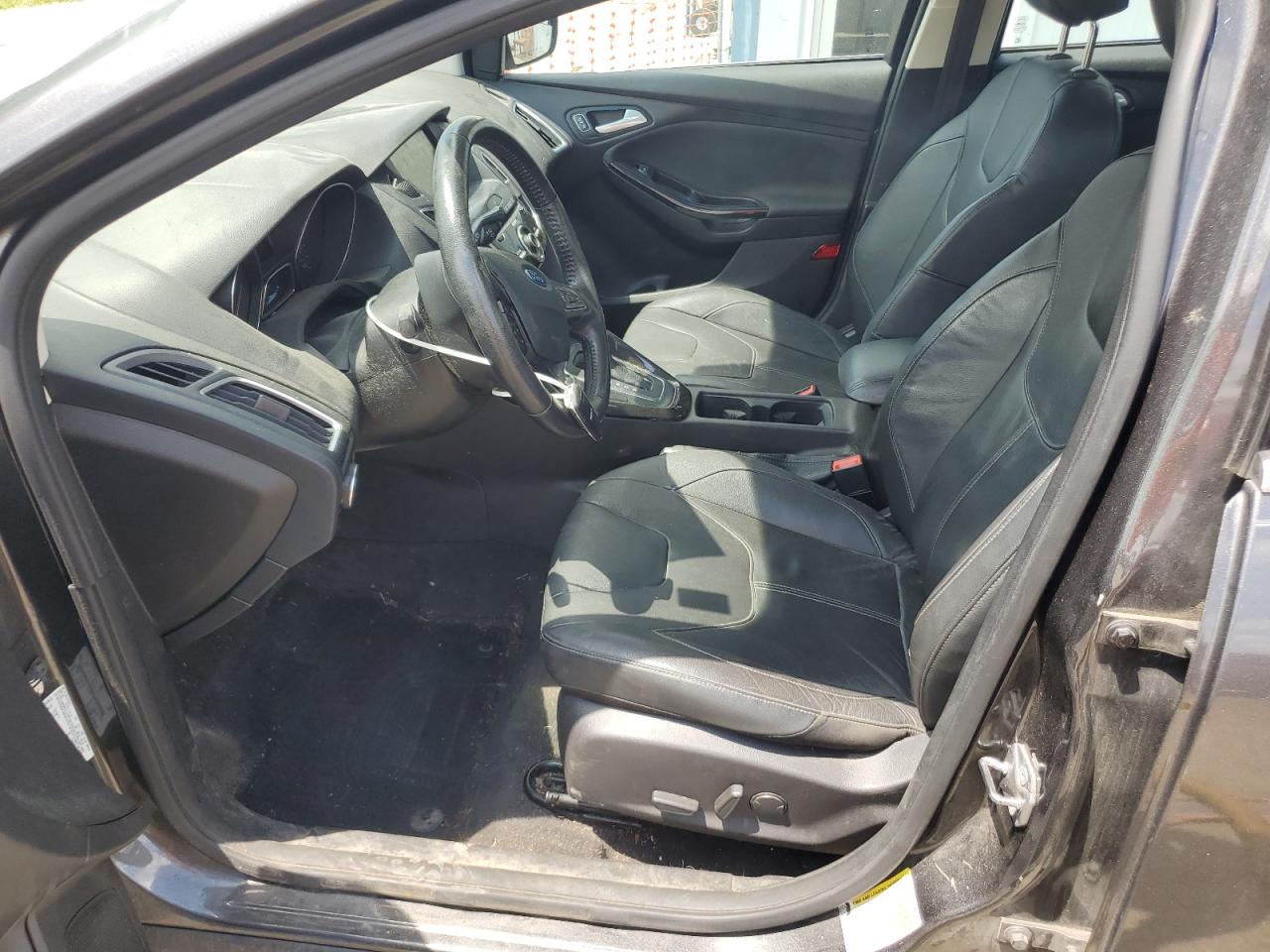 2015 Ford Focus Titanium VIN: 1FADP3J29FL293280 Lot: 65243455