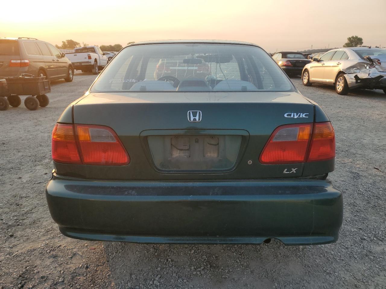 2000 Honda Civic Lx VIN: 2HGEJ6673YH589404 Lot: 63687065
