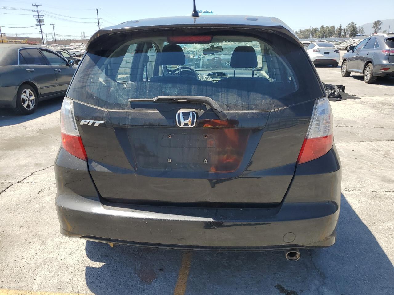 2009 Honda Fit Sport VIN: JHMGE88419S003799 Lot: 64296275