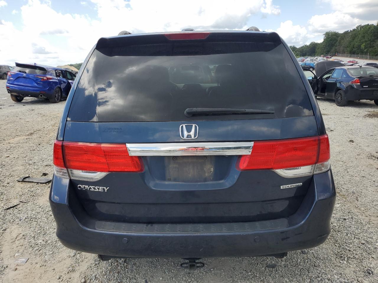 2010 Honda Odyssey Touring VIN: 5FNRL3H9XAB105750 Lot: 65412435