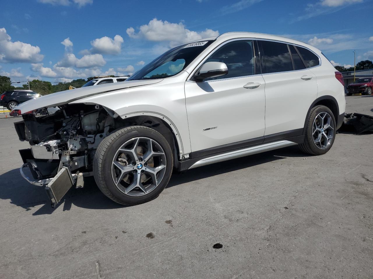 2017 BMW X1 xDrive28I VIN: WBXHT3C3XH5F77687 Lot: 65826865