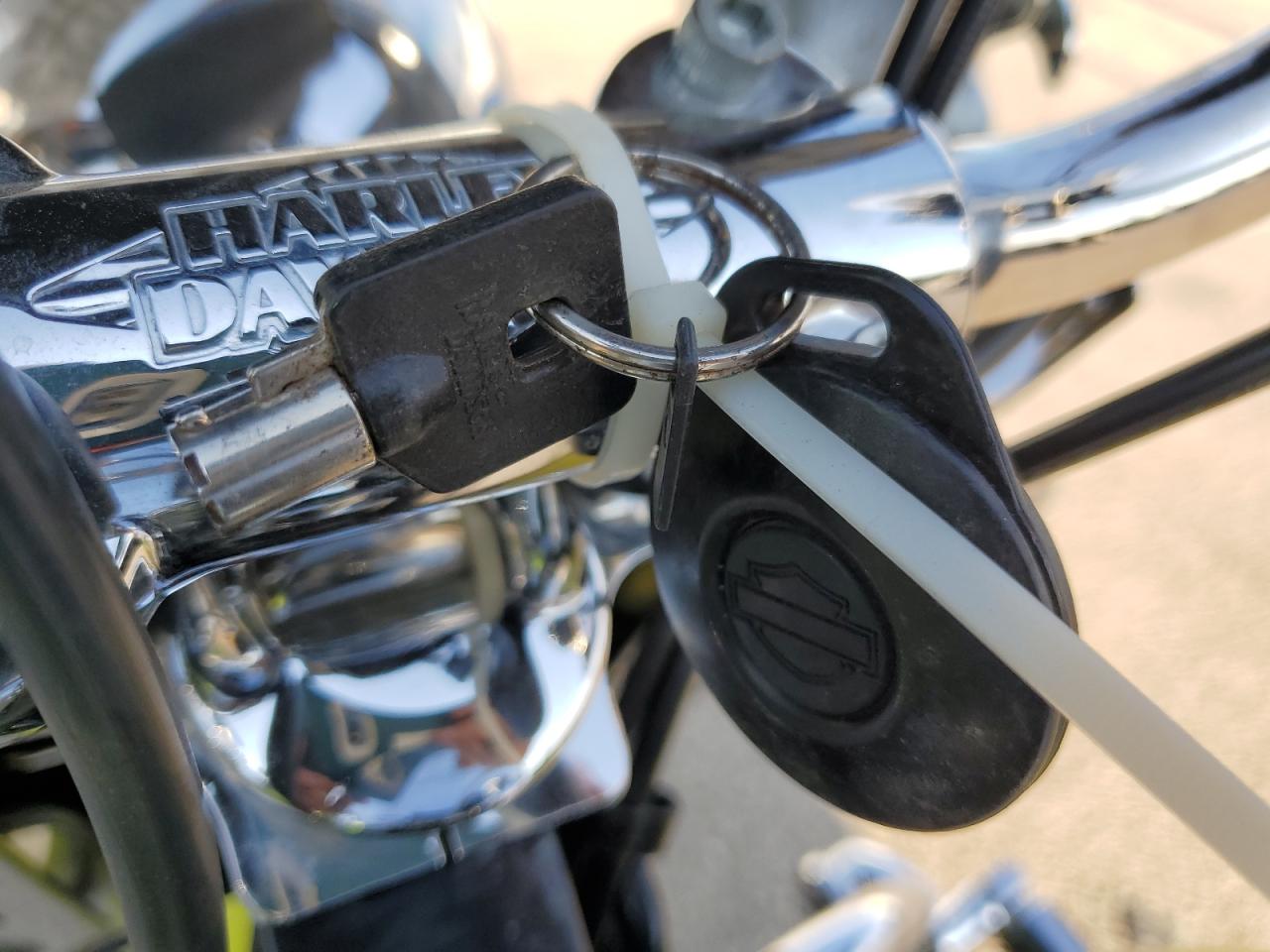 2011 Harley-Davidson Flstc VIN: 1HD1BW517BB034798 Lot: 66639025