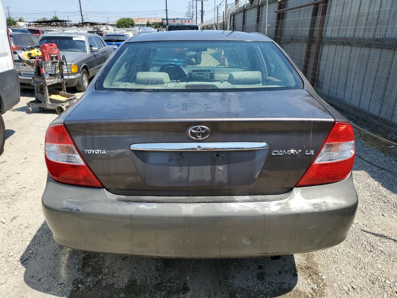 2003 Toyota Camry Le VIN: JTDBE32KX30215061 Lot: 65217635