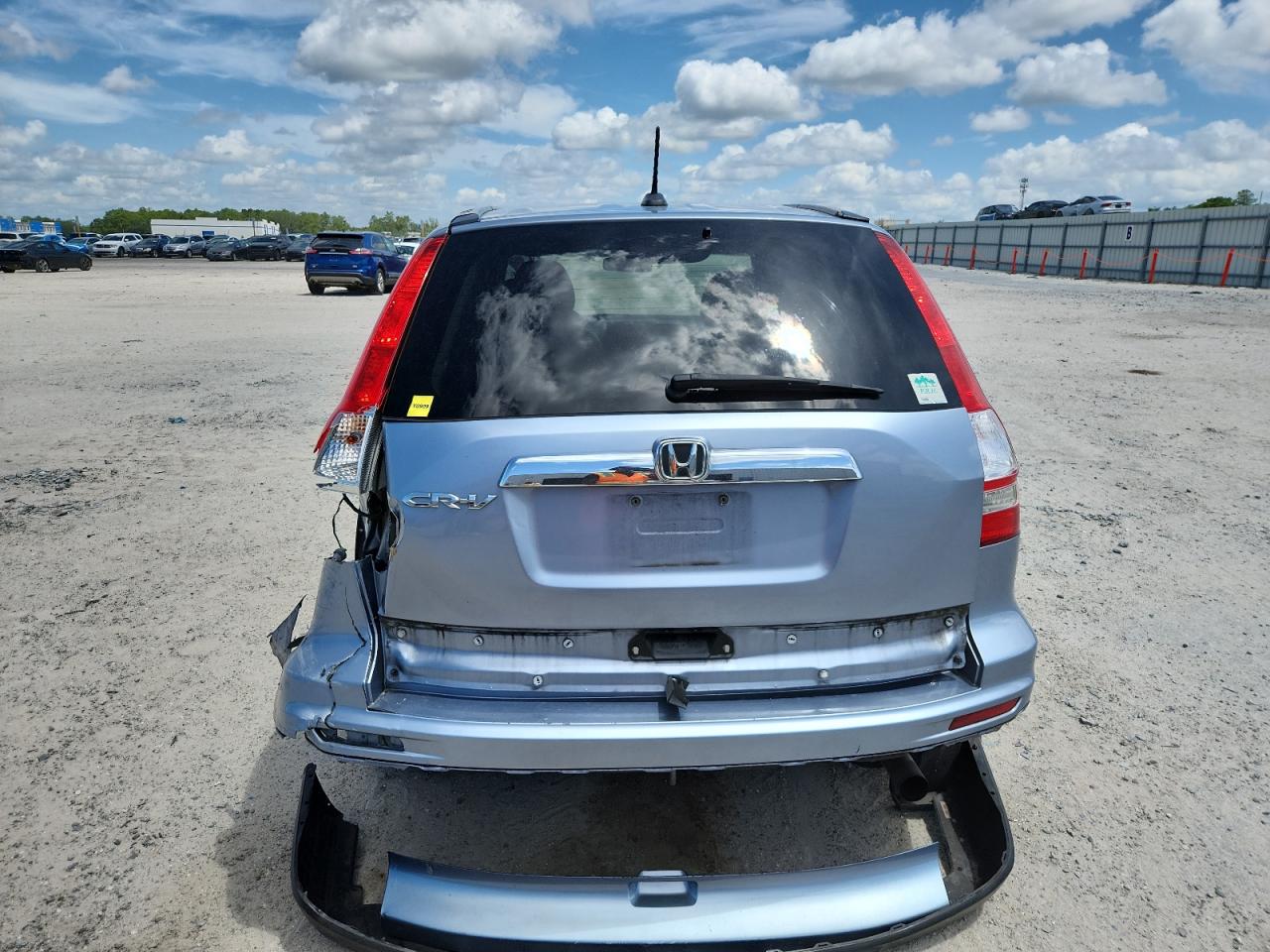 2010 Honda Cr-V Exl VIN: 5J6RE3H75AL023215 Lot: 64213385