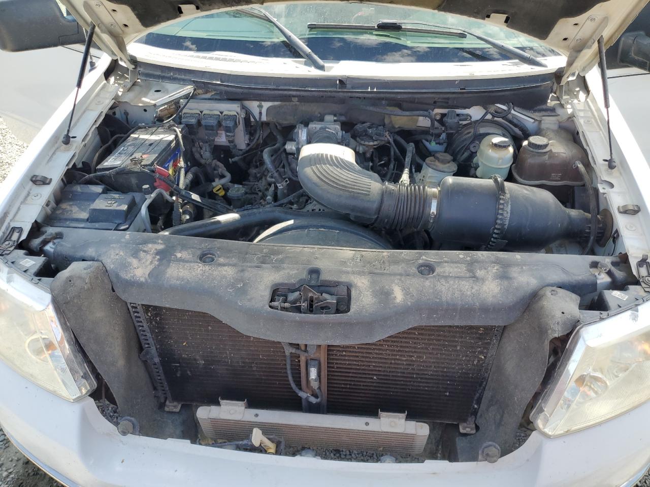 2004 Ford F150 VIN: 1FTRX12WX4NA69734 Lot: 62692495