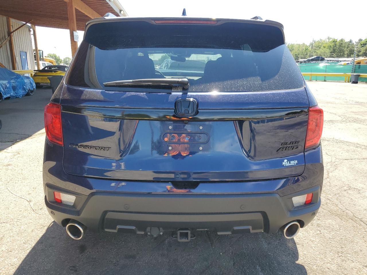 2023 Honda Passport Elite VIN: 5FNYF8H02PB017947 Lot: 63519435