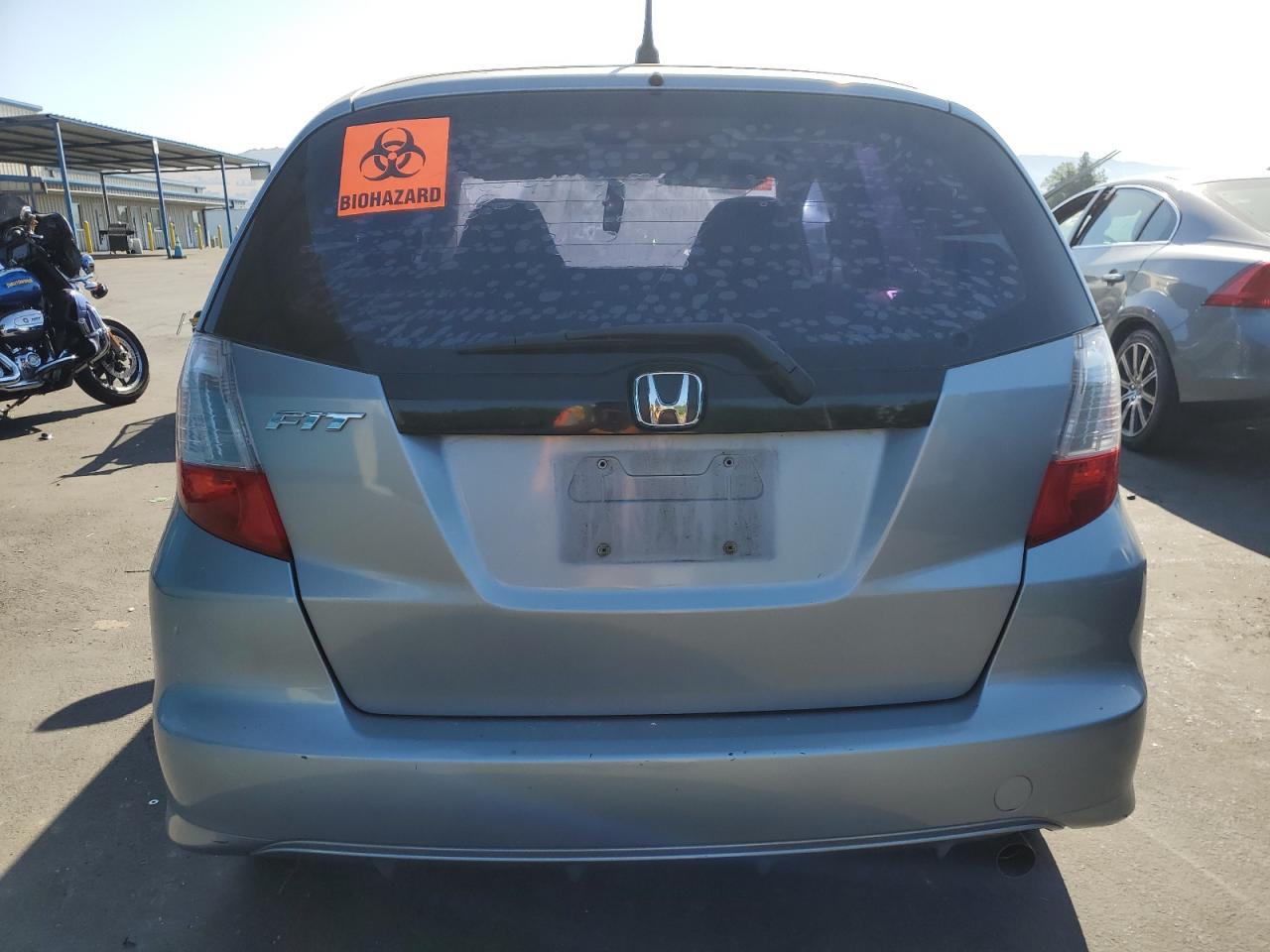2011 Honda Fit VIN: JHMGE8H34BC007059 Lot: 63339965