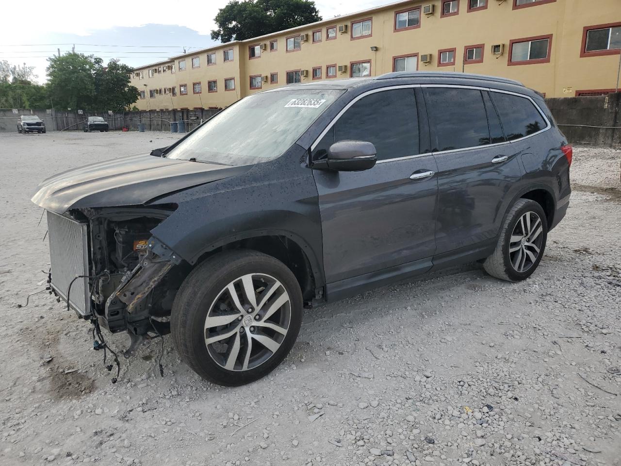 2017 Honda Pilot Touring VIN: 5FNYF5H94HB011565 Lot: 63282635
