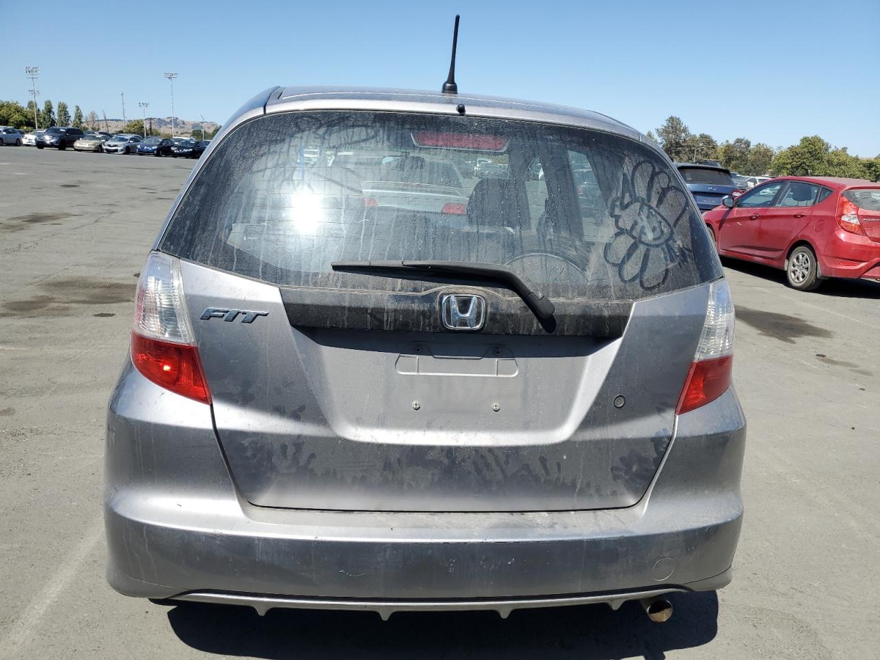 2009 Honda Fit VIN: JHMGE88219S020651 Lot: 63081175