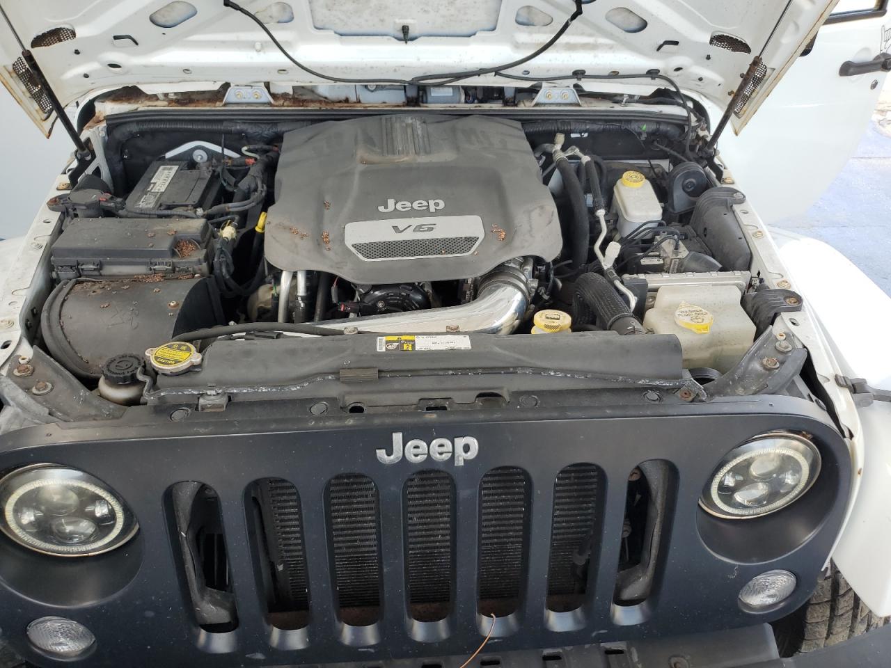 2015 Jeep Wrangler Sport VIN: 1C4AJWAG0FL690131 Lot: 65012915