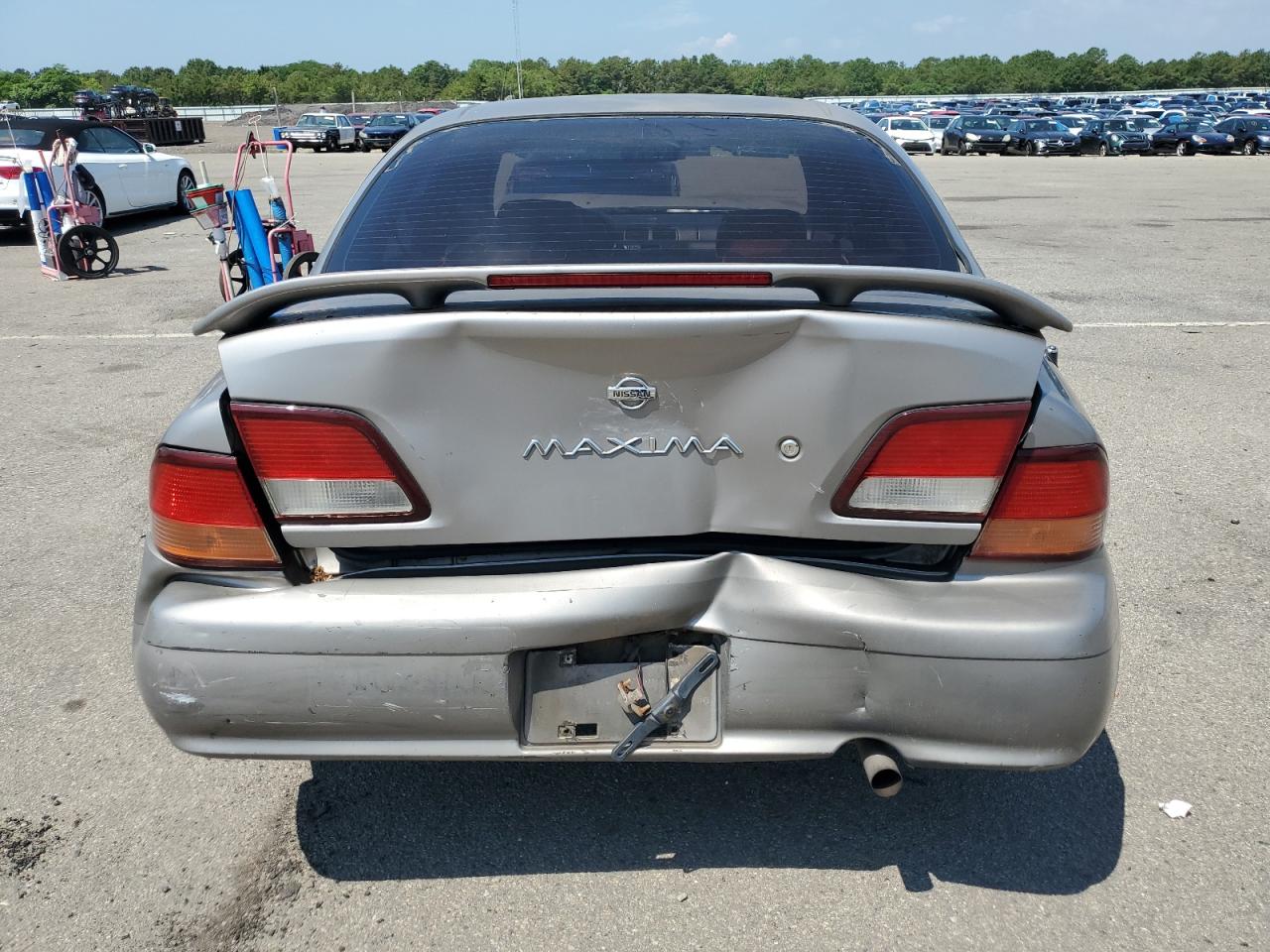 1998 Nissan Maxima Gle VIN: JN1CA21A4WT306111 Lot: 63690015