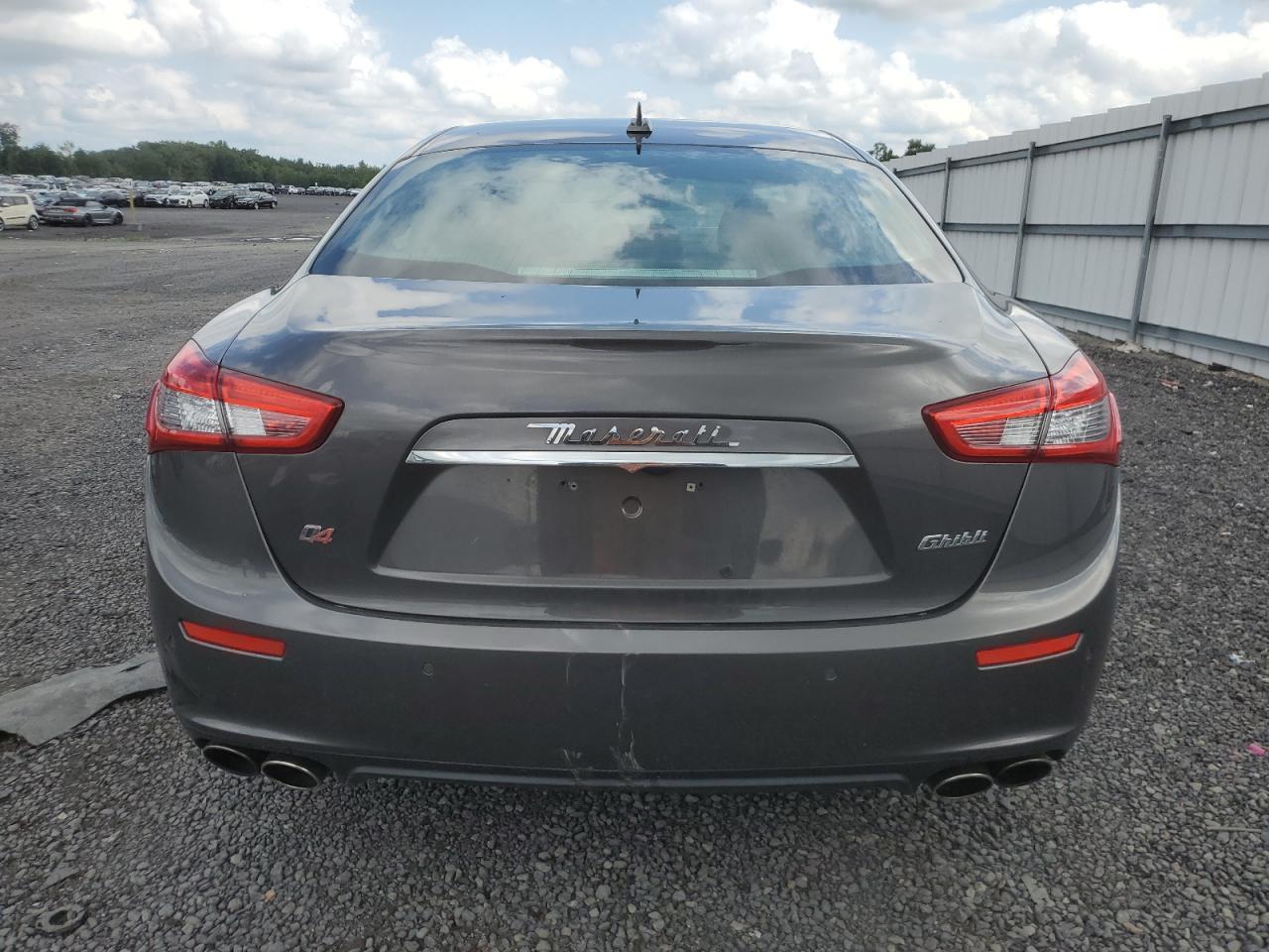 2014 Maserati Ghibli S VIN: ZAM57RTA7E1090464 Lot: 64169015