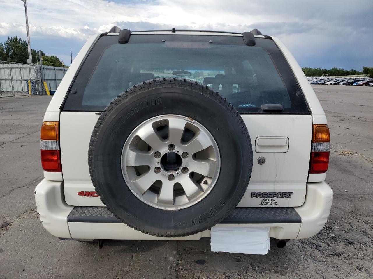 1999 Honda Passport Ex VIN: 4S6CM58W2X4421408 Lot: 63278385