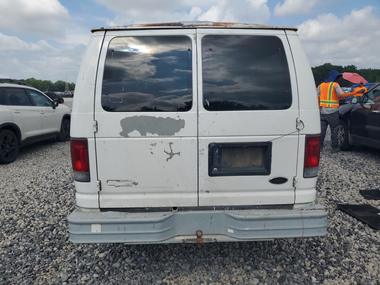 2004 Ford Econoline E150 Wagon VIN: 1FMRE11L94HA82935 Lot: 63764405
