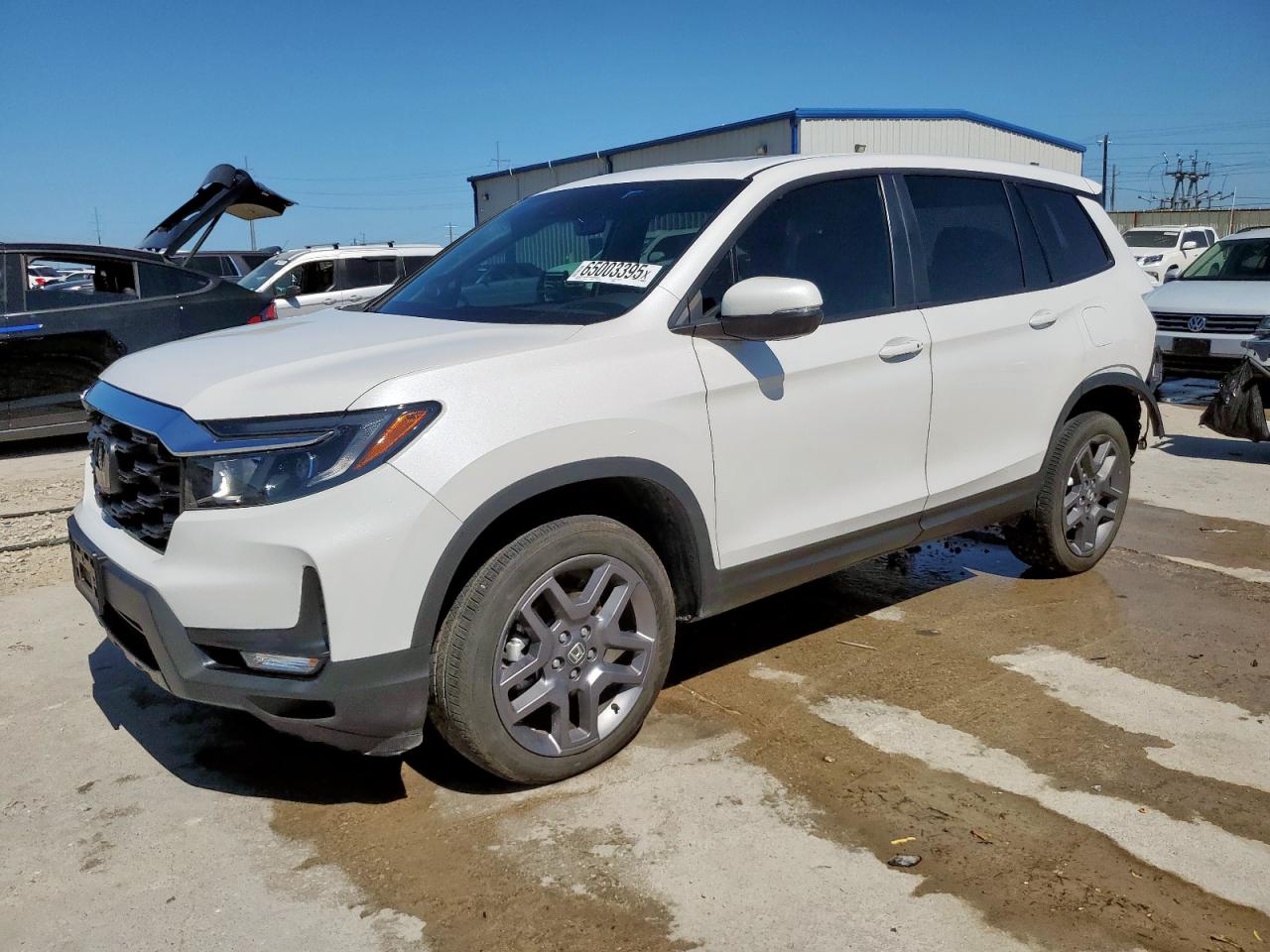2023 HONDA PASSPORT EXL | 5FNYF8H56PB009006