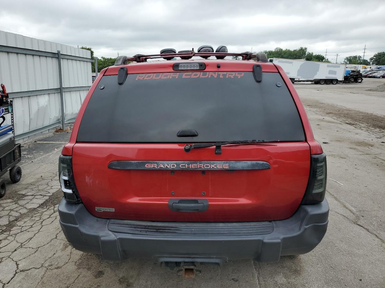 2003 Jeep Grand Cherokee Laredo VIN: 1J4GW48S03C594192 Lot: 63747045