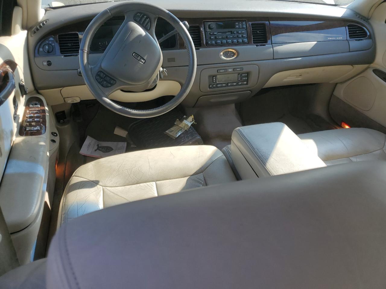 1999 Lincoln Town Car Cartier VIN: 1LNHM83W7XY605873 Lot: 64357805