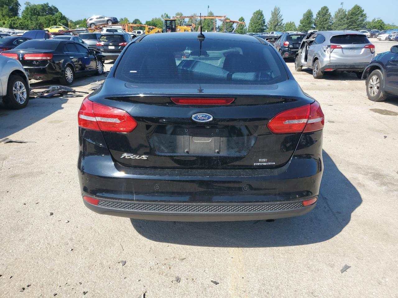 2016 Ford Focus Se VIN: 1FADP3F22GL372350 Lot: 65071235