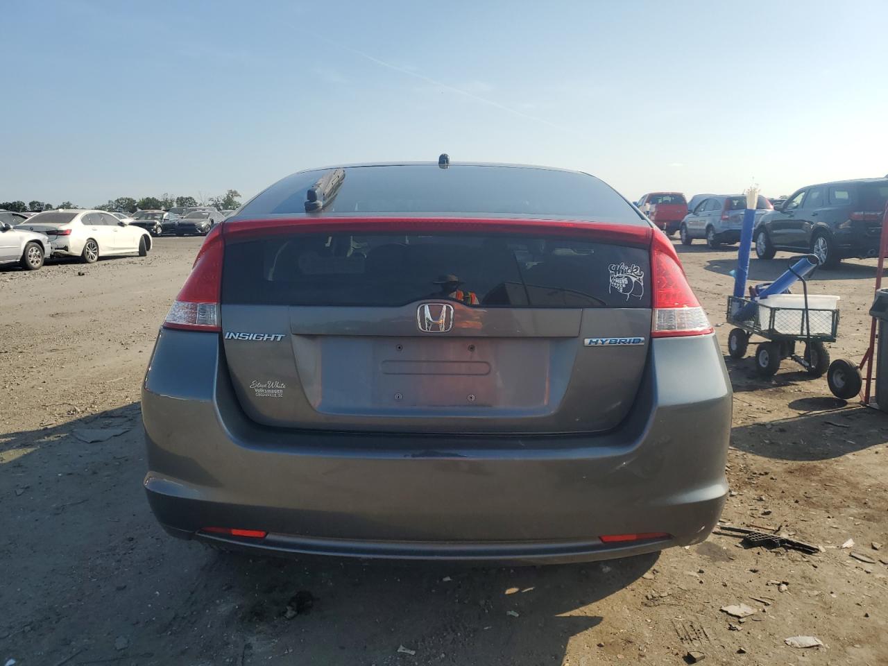 2010 Honda Insight Lx VIN: JHMZE2H5XAS013511 Lot: 62628845
